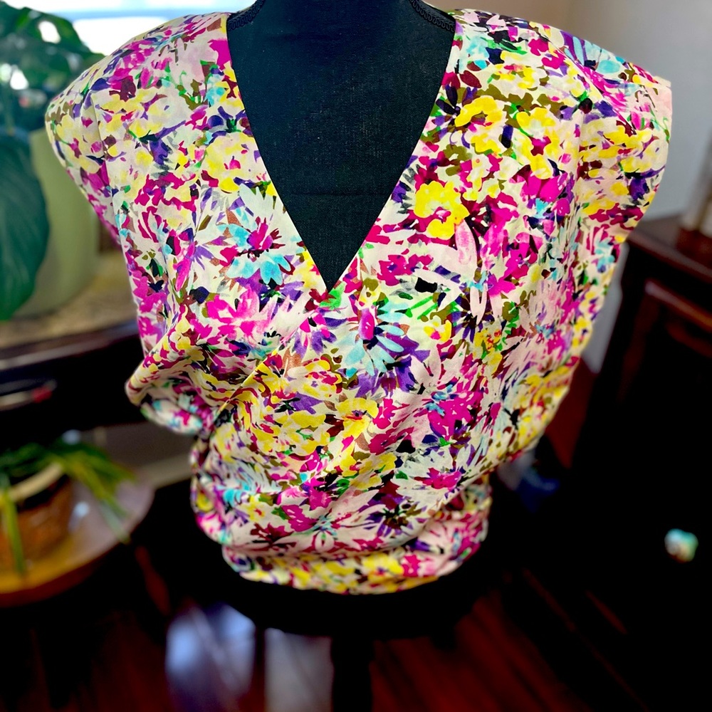 CAbi Eden Floral Wrap Top. Beautiful floral colors. Size S.